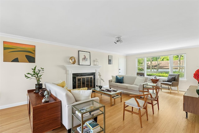 107 California Ave, Freeport, NY 11520 - living area with crown molding, a fireplace, and light wood finished floors
