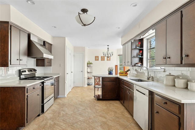 107 California Ave, Freeport, NY 11520 - kitchen with stainless steel electric stove, dishwasher, wall chimney range hood, tasteful backsplash, and a chandelier