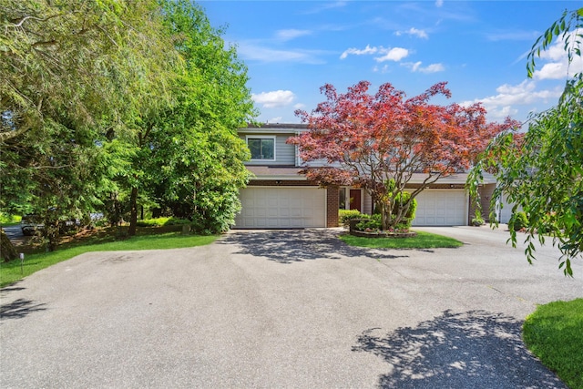 31 Boathouse Ln E, Bay Shore, NY 11706 - view of front of home featuring asphalt driveway
