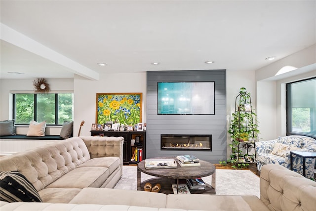 31 Boathouse Ln E, Bay Shore, NY 11706 - living room with recessed lighting and a fireplace