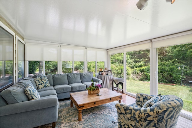 31 Boathouse Ln E, Bay Shore, NY 11706 - sunroom featuring plenty of natural light and wood finished floors