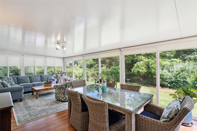 31 Boathouse Ln E, Bay Shore, NY 11706 - sunroom featuring wood finished floors and a deck
