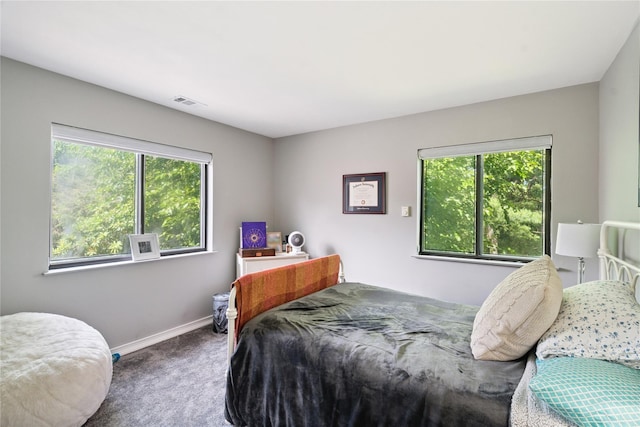 31 Boathouse Ln E, Bay Shore, NY 11706 - bedroom with carpet flooring and baseboards