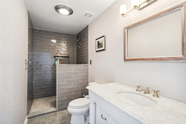 31 Boathouse Ln E, Bay Shore, NY 11706 - full bathroom featuring a tile shower, vanity, tile walls, and tile patterned flooring