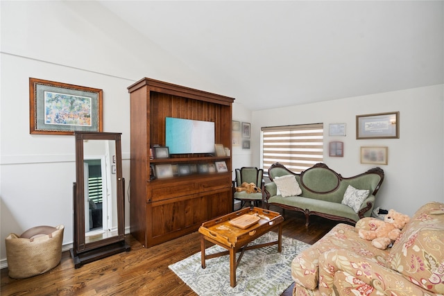 31 Boathouse Ln E, Bay Shore, NY 11706 - living room featuring wood finished floors and lofted ceiling