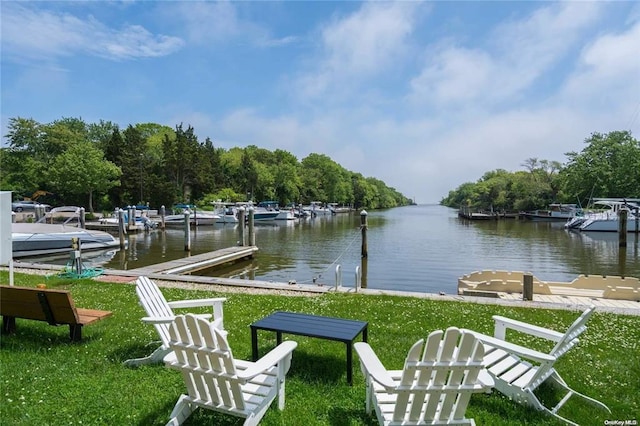 31 Boathouse Ln E, Bay Shore, NY 11706 - dock with a yard and a water view