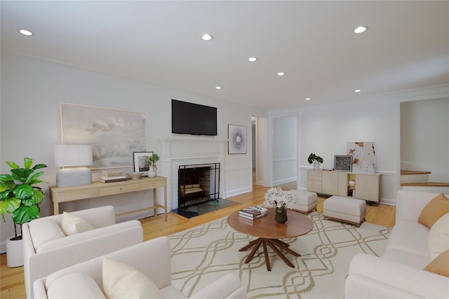 153 Park Ave, Manhasset, NY 11030 - living room featuring recessed lighting, wood finished floors, and a fireplace with flush hearth