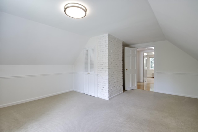 153 Park Ave, Manhasset, NY 11030 - bonus room featuring carpet flooring and vaulted ceiling