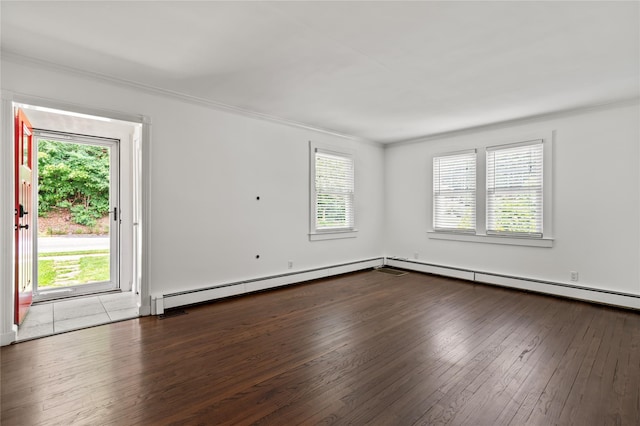 224 Woodbury Rd, Huntington, NY 11743 - spare room featuring healthy amount of natural light, hardwood / wood-style floors, crown molding, and a baseboard radiator