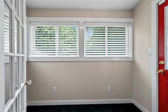 224 Woodbury Rd, Huntington, NY 11743 - spare room featuring baseboards