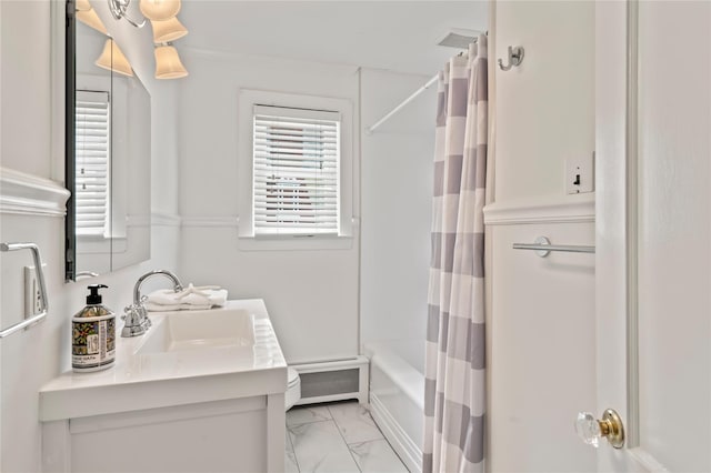 224 Woodbury Rd, Huntington, NY 11743 - full bath with marble look tiles, vanity, and shower / bath combo with shower curtain