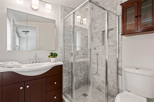 224 Woodbury Rd, Huntington, NY 11743 - full bathroom featuring vanity and a shower stall