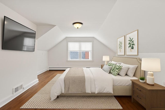 224 Woodbury Rd, Huntington, NY 11743 - bedroom featuring dark wood finished floors and lofted ceiling
