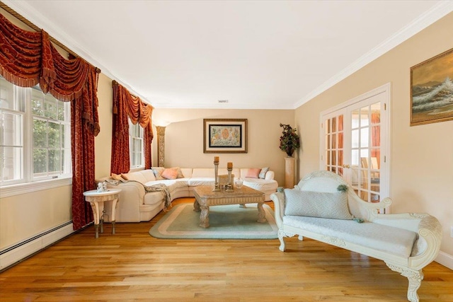 2 Apple Ct, Eastchester, NY 10709 - living area with a baseboard heating unit, crown molding, and wood finished floors