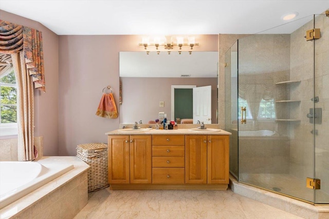 2 Apple Ct, Eastchester, NY 10709 - bathroom featuring double vanity, a garden tub, a shower stall, and marble finish flooring
