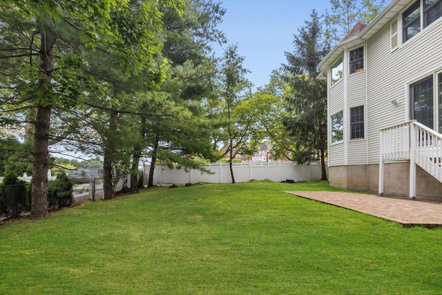 2 Apple Ct, Eastchester, NY 10709 - fenced backyard featuring a patio area