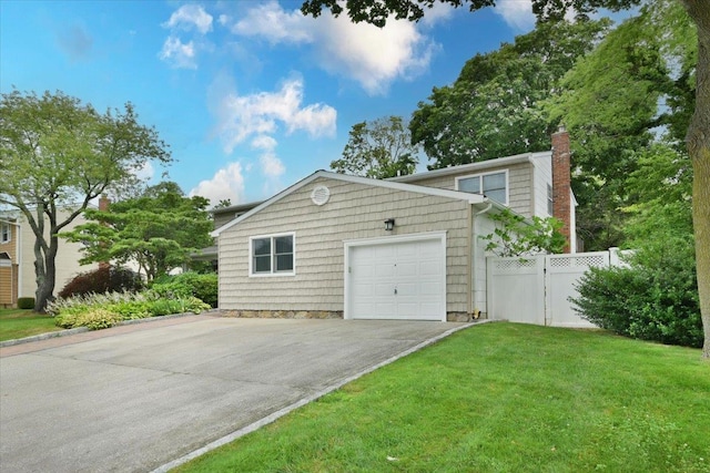 7 Albergo Ln, Syosset, NY 11791 - garage featuring asphalt driveway and a gate