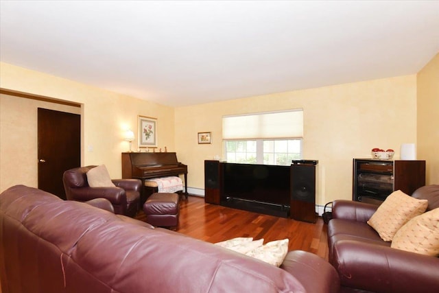 7 Albergo Ln, Syosset, NY 11791 - living room featuring beverage cooler, wood finished floors, and a baseboard radiator