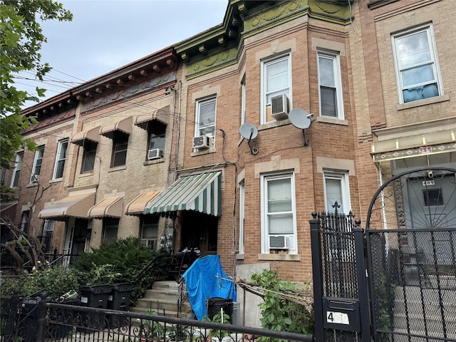 407 Eldert Ln, Brooklyn, NY 11208 - view of property featuring cooling unit and a fenced front yard