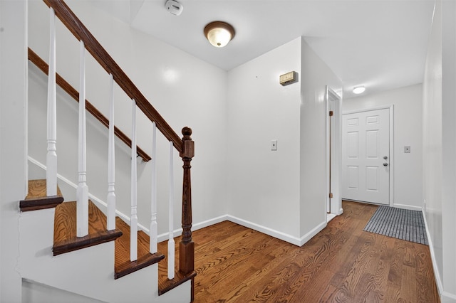 418 Pawnee Ct, Suffern, NY 10901 - foyer entrance featuring wood finished floors and stairway