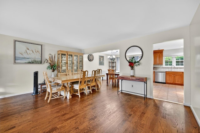 418 Pawnee Ct, Suffern, NY 10901 - dining room with a chandelier and dark wood finished floors