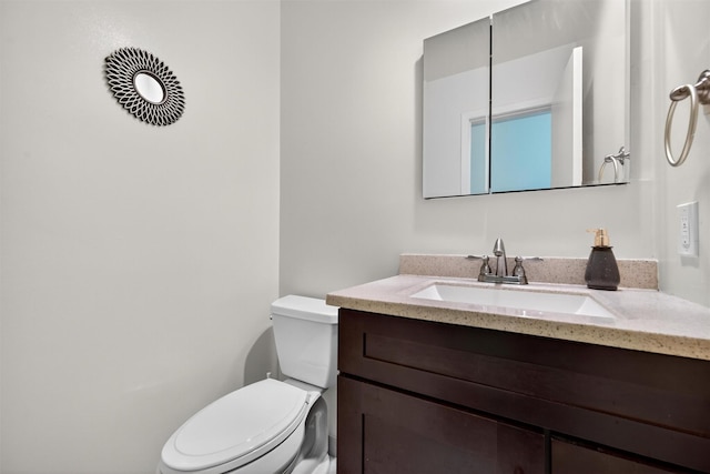 418 Pawnee Ct, Suffern, NY 10901 - half bathroom featuring toilet and vanity