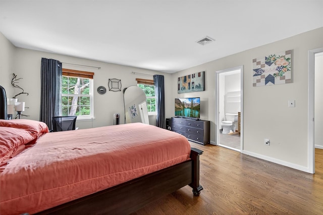 418 Pawnee Ct, Suffern, NY 10901 - bedroom with wood finished floors and ensuite bathroom