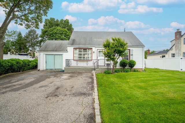 47 Cardinal Rd, Levittown, NY 11756 - cape cod house featuring a shingled roof