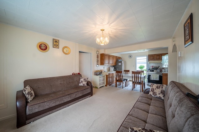 47 Cardinal Rd, Levittown, NY 11756 - living room featuring a chandelier and light carpet