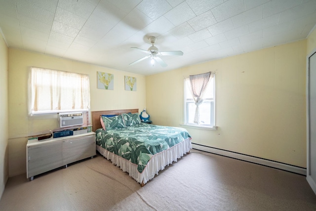 47 Cardinal Rd, Levittown, NY 11756 - bedroom featuring a baseboard radiator, carpet, a ceiling fan, and cooling unit