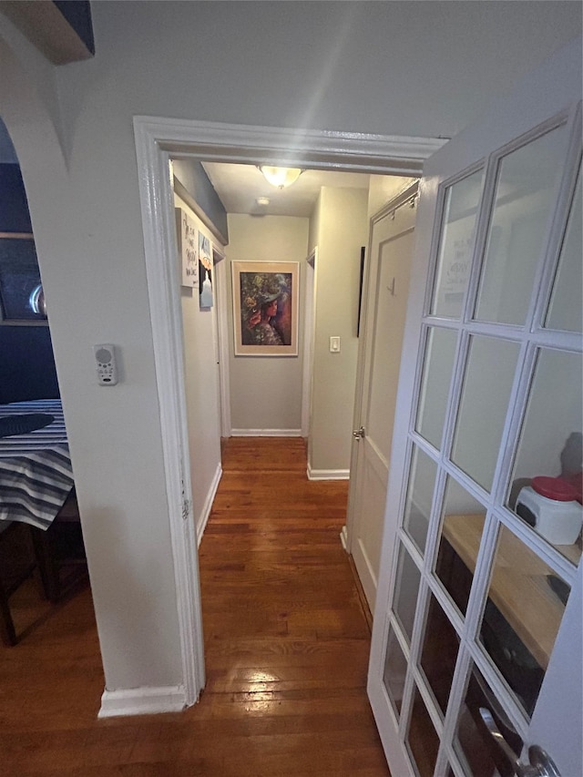 21543 48th Ave Unit 1E, Bayside, NY 11364 - corridor with dark wood-type flooring and arched walkways