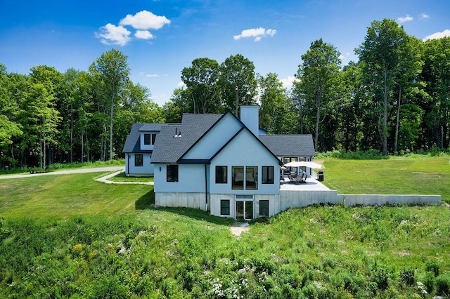 75 Red Fox Ln, Salt Point, NY 12578 - rear view of property with a chimney and a yard