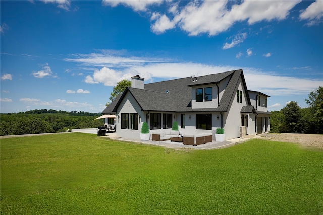 75 Red Fox Ln, Salt Point, NY 12578 - back of house with a chimney, a lawn, a sunroom, and stucco siding