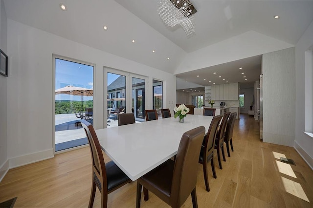 75 Red Fox Ln, Salt Point, NY 12578 - dining room with lofted ceiling, light wood-style floors, recessed lighting, and a chandelier