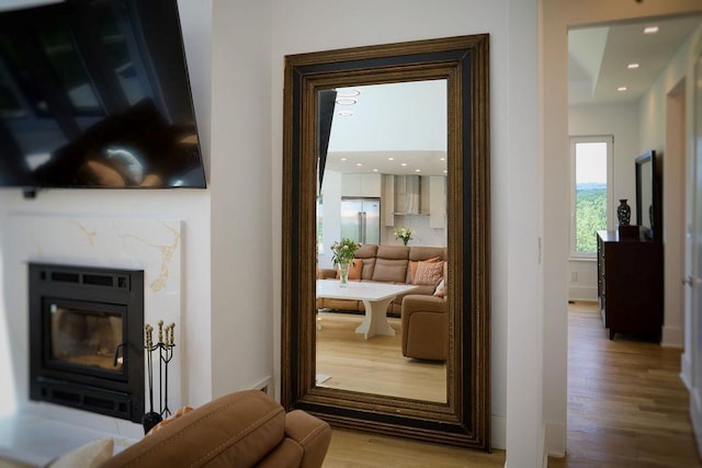 75 Red Fox Ln, Salt Point, NY 12578 - living room with wood finished floors, a glass covered fireplace, and recessed lighting