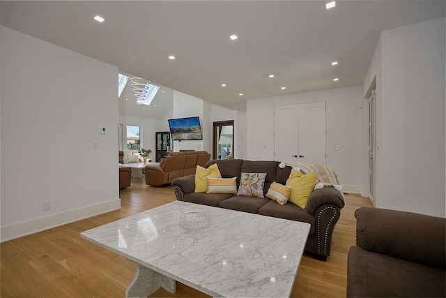 75 Red Fox Ln, Salt Point, NY 12578 - living area featuring light wood-style floors, a skylight, recessed lighting, and high vaulted ceiling
