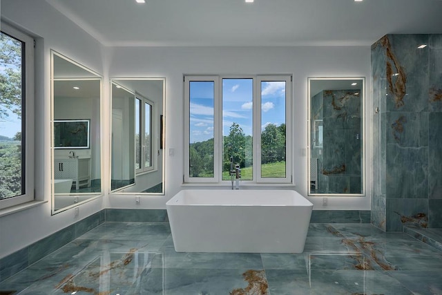75 Red Fox Ln, Salt Point, NY 12578 - bathroom with marble tiled flooring, a freestanding tub, recessed lighting, and a shower