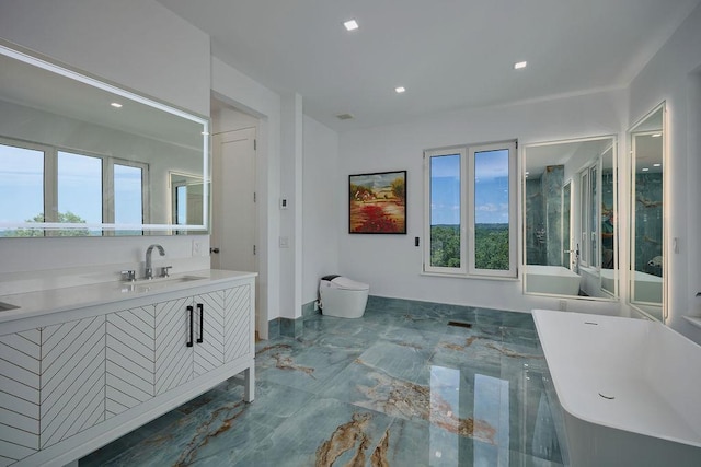 75 Red Fox Ln, Salt Point, NY 12578 - full bathroom featuring marble tiled flooring, a soaking tub, vanity, and recessed lighting