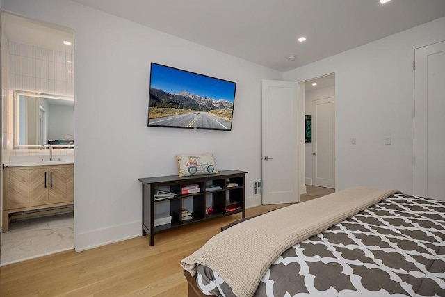75 Red Fox Ln, Salt Point, NY 12578 - bedroom with recessed lighting, connected bathroom, and light wood finished floors