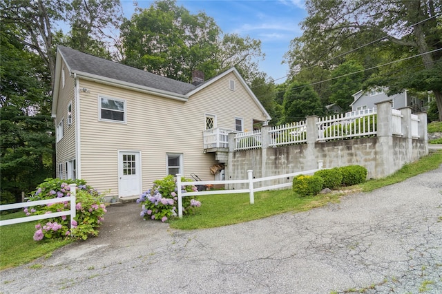 126 Tanglewylde Rd, Lake Peekskill, NY 10537 - view of front of home featuring a chimney