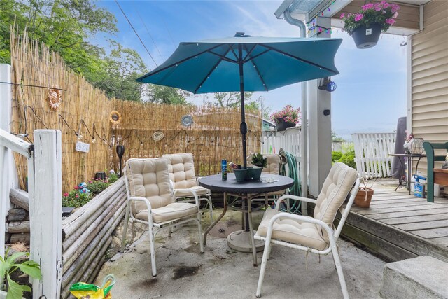 126 Tanglewylde Rd, Lake Peekskill, NY 10537 - view of patio / terrace with outdoor dining area and a wooden deck