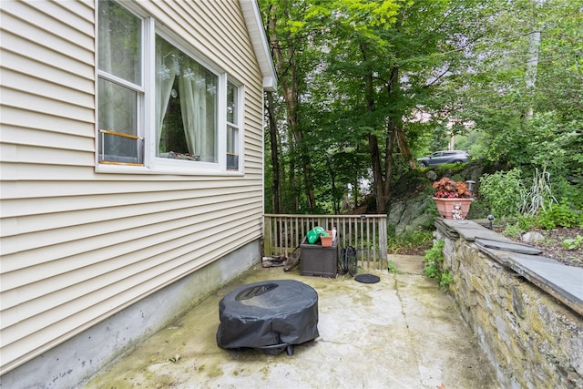126 Tanglewylde Rd, Lake Peekskill, NY 10537 - view of patio / terrace with an outdoor fire pit
