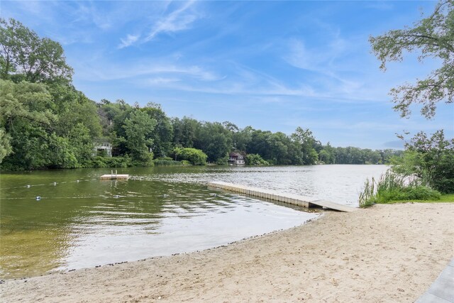 126 Tanglewylde Rd, Lake Peekskill, NY 10537 - water view with a boat ramp and a heavily wooded area