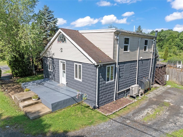 578 S St, Plattekill, NY 12528 - back of property with a patio and roof with shingles