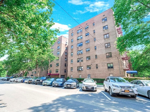 29-49 137th St Unit 6G, Flushing, NY 11354 - view of apartment building / complex featuring uncovered parking
