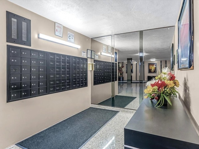 29-49 137th St Unit 6G, Flushing, NY 11354 - surrounding community featuring mail area and a textured ceiling