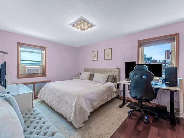 29-49 137th St Unit 6G, Flushing, NY 11354 - bedroom with wood finished floors and a desk