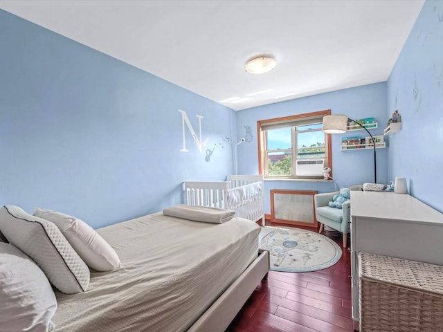 29-49 137th St Unit 6G, Flushing, NY 11354 - bedroom featuring dark wood-style flooring