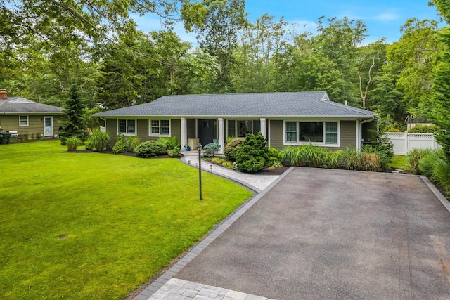24 Canvasback Ln, East Quogue, NY 11942 - ranch-style house featuring roof with shingles