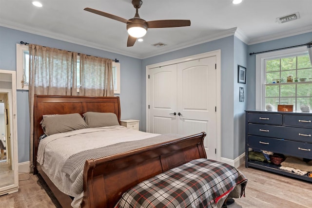 24 Canvasback Ln, East Quogue, NY 11942 - bedroom featuring light wood-style flooring, a closet, a ceiling fan, crown molding, and recessed lighting